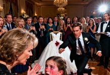 At my sister’s wedding, the music suddenly stopped when my mother slapped my little girl across the face. “Why did you spill wine on the wedding dress?!” she screamed, her voice echoing through the entire hall. My sister’s groom stormed toward us, anger blazing in his eyes. “You’ll pay for what you’ve done!” My daughter trembled, tears streaming down her cheeks. “I didn’t do it! Please, believe me!” she cried. But no one did. The guests whispered, cameras flashed, and my family looked at me with disgust. Then, a waiter nervously spoke up, “Ma’am… we can review the security footage.” In that moment, my mother’s smug look faded — and the groom’s face went pale.