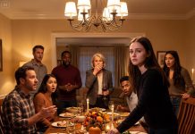 At Thanksgiving dinner, my mother raised her glass and sneered, “My eldest daughter lives luxuriously, successful… and then there’s you—oh, what a series of disappointing choices.” The whole table laughed with her, while I sat still, gripping my napkin tightly. But when she continued praising my sister like a queen, I stood up, placed an envelope on the table, and said, “If you admire her life that much… you should know the truth behind it.” The room fell silent instantly.