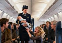 I was carrying my three-month-old baby on a flight home to reunite with my husband when the flight attendant announced the plane was over capacity. The entire cabin fell silent — until my baby began to cry. “Your child is too loud,” she snapped. “You need to get off the plane.” Before I could even react, she yanked my baby from my arms and forced me down the jet bridge while passengers stared. Trembling and humiliated, I made one call with shaking hands: “Flight 302… turn back.” Five minutes later, alarms sounded through the terminal, the plane halted on the runway, and every flight attendant was ordered to stand down as the airline’s CEO rushed toward me…