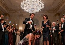 At a party filled with billionaires, I caught my husband tenderly holding the daughter of a powerful tycoon. When I confronted him, he shoved me, spilling wine all over my dress. “You’re embarrassing me! Go home—this is my league!” he snapped. The tycoon chuckled, “Your wife looks like one of the hired help.” I stood up, calmly brushed off the stain, and called my assistant. “Cancel the contract,” I said. In that single second, the “maid” they mocked was about to wipe out the tycoon’s entire billion-dollar empire.