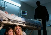 I had just given birth when my eight-year-old daughter rushed into the hospital room, her eyes wide with alarm. She pulled the curtains shut and whispered urgently into my ear: “Mom… get under the bed. Right now.” My heart tightened, but I obeyed. We pressed ourselves together under the bed, barely daring to breathe. Then heavy footsteps entered the room. As I started to peek out, she gently placed her hand over my mouth—fear shining in her eyes like I’d never seen before. And then…