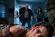 At midnight, my barracks door burst open. My stepfather charged in, snarling, “You think wearing a uniform makes you untouchable?” One blow dislocated my shoulder, blood flooding my vision, while my mother stood frozen in silence. With my last strength, I whispered into the radio, “Help me…” I collapsed—and that was the moment everything turned, in a way no one saw coming.