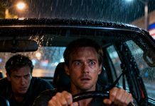 I’d spent seven years driving through rain just to survive. That night, I picked up a man my age. Halfway through the ride, he asked quietly, “Where’s your mom?” “She died three years ago,” I replied. He fell silent—then said something that made my grip tighten on the steering wheel. In that moment, I understood: some strangers arrive with questions that change everything… and I wasn’t ready for the answer.