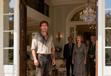 I worked as a dishwasher to send money home. “Dad is seriously ill,” they said, “we need cash now.” I believed them—until I came back early. The door opened to a luxury mansion and their laughter froze. “Why are you here?” my mother gasped. I stayed quiet and smiled. Because in that moment… the perfect life they built was about to collapse.