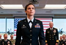 My father-in-law dragged me into the briefing just to humiliate me. “Go on,” he sneered to the officers. “Is your call sign Princess Pilot?” The room burst into laughter. I stepped forward, steady and unflinching. “No, Admiral,” I said. “It’s Valkyrie 77.” The laughter died instantly. And in that silence, everyone finally understood something he never had— respect isn’t asked for. It’s earned.