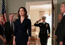 “She dropped out of the Navy,” my father announced, “a disgrace.” Laughter filled the room. I stood still—until the door opened. An officer stepped in and said firmly, “Excuse me.” He looked straight at me and snapped to attention. The room froze. My father stammered. I smiled—because the truth had just walked in.