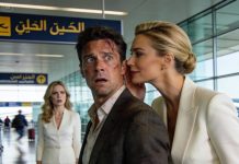 After an argument, my wealthy wife canceled my flight ticket and left me alone at Dubai Airport. No phone. No wallet. A female billionaire approached me and whispered, “Pretend you’re my husband. My driver will be here any second.” Then she added, “Your wife will regret this.”