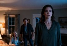 I came home three days early and saw a strange car in the driveway. My stomach dropped. Inside, I heard my husband laugh, whispering to another woman, “You’re so tight… not like my wife.” I didn’t scream. I didn’t cry. I stepped forward and said one sentence that drained the color from both their faces. In that moment, I made a choice that would end their affair—and rewrite every rule of our lives.