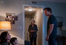 I thought I was doing the right thing when I said, “Mom, you can stay with us.” But the night I overheard her whisper, “He’s not his son,” my blood ran cold. I confronted her, and she smirked, “You were never meant to know.” Then my wife started crying, my son asked, “Dad, why is Grandma lying?” and the truth finally surfaced—one that would tear our family apart forever.