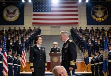 “She quit the Navy,” my father announced loudly to everyone. I remained silent at my brother’s SEAL pinning ceremony, offering no explanation. Then the general locked eyes with me, went still, and said, “Rear Admiral… you’re present?” Two hundred SEALs stood up in unison. The color vanished from my father’s face — because in that instant, every lie he had built his pride on came crashing down.