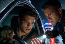 “The cop leaned into my window and said quietly, ‘You sure you don’t want to drive straight to the hospital instead?’ I laughed, confused—until he shined his flashlight on my hands and his face changed. ‘When did the shaking start?’ he asked. My phone buzzed at the same time. One text. One number. And suddenly I understood why he wasn’t writing a ticket.”