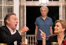 My son never knew I was a wealthy CEO, earning millions of dollars a month. He always thought I lived off a small pension. When he invited me to dinner with his future in-laws, I decided to test them by pretending to be a poor woman who had lost everything. But as soon as I walked through the door, her mother tilted her chin up and said, “She looks… too ordinary! I hope she doesn’t expect us to help with the wedding expenses.” I said nothing. But her father looked at me for a second – then suddenly stood up in fear…