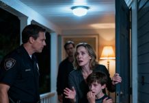 Late one night, the doorbell shattered the silence. I opened it to find a police officer on my porch. “Ma’am, we’re here for your husband.” I went cold. “W-what did he do?” The officer leaned in. “Your son reported him.” I spun toward my son. He was shaking, eyes glassy, and he whispered, “Mom… I’ve wanted to tell you the truth for a long time. I just didn’t know how.”