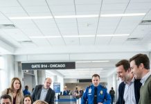 “Hey, careful—she might go into labor right here,” a woman joked, and the group around her burst into laughter. I kept my eyes on the departure screen, pretending not to hear them. My feet were swollen, my back aching, but I refused to move. Then one of them knocked my carry-on aside and said, “Relax, it’s just a joke.” That’s when the airport loudspeaker crackled—and everything changed.