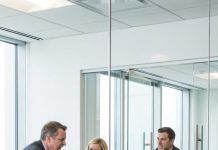 I still remember the sound of her coffee mug shattering on the tile when my boss said, “You’re fired. Let this be a lesson to everyone.” The whole office went dead silent. She tried to speak—“I have a son… I can’t lose this job”—but he wouldn’t even look at her. My hands were shaking, but not as much as his would be seconds later… when the elevator doors opened.