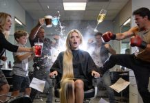 “Cash only,” the stylist said, tying my hair into a thick bundle. I swallowed and agreed. As the scissors closed, a voice behind me said, “That won’t be necessary.” I turned and froze—it was my grandfather, the man they said was powerless now. He checked his watch. “Give me four minutes,” he said. What happened next didn’t save my hair—but it rewrote my future.