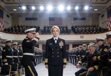 “She quit the Navy,” my father told everyone. I stood silently at my brother’s SEAL promotion ceremony… like a shadow no one noticed. Then a general walked up to me and snapped to attention. “Rear Admiral… you’re here as well, ma’am?” Two hundred SEALs rose to their feet at once. The entire hall fell silent. And for the first time in my life… my father turned pale.