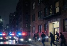 My Uber ride home was supposed to be simple—until the driver suddenly locked the doors at 2 a.m. “Don’t get out here,” he said urgently. Confused, I tried to open the door anyway. “Relax. I live right there.” He shook his head, eyes wide with fear. “Please… wait five minutes.” At 2:05, three police cars surrounded us with their sirens blaring. And when the officers rushed toward the building I was about to enter… I finally understood why.