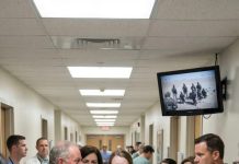 In the military hospital hallway, the father roared for his son’s bride-to-be to be kicked out, accusing her of being a jinx. But when the combat video started rolling, the truth hit like a slap—revealing the one who should be ashamed the most.