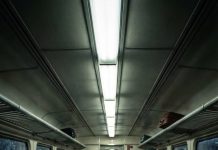 “Change carriages. Now.” The conductor’s hand trembled as he passed me the note. I laughed it off—until he grabbed my wrist and whispered, “If you stay… you won’t make it.” My heart dropped. I moved. Just in time. The lights flickered, then everything went dark. From the carriage I left, something slammed against the doors… and it wasn’t human.