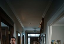 The millionaire arrived home earlier than usual, expecting the house to be empty and quiet. But the moment he stepped inside, the maid rushed over and whispered urgently, “Quiet.” Confused, he froze in place. Then she pointed toward the living room. What he saw—and why she had warned him to stay silent—was something he never expected to witness in his own home.