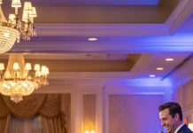 At my brother’s merger celebration, he thought it would be “fun” to introduce me like this: “This is my smelly little sister—no decent job, no future, just manual labor.” I’ve never bragged and I’ve kept my real wealth hidden—but now my greedy family is about to learn the truth in a very painful way.