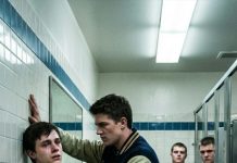 The new transfer student was cornered in the restroom and forced to pay “protection money.” He cried, “I’m going to call the police.” They burst out laughing. “Go ahead. I’ve got people who’ll handle it.” He didn’t know the microphone in his smartwatch was already recording. At the flag ceremony, before the principal could even speak, the school loudspeakers played a clear voice: “Pay up—or I’ll break your arm.” The entire schoolyard froze.