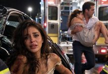 We were both trapped in the same car wreck—me, his wife, bleeding and barely conscious, and the woman he had loved before me. When the rescue team pulled us out, he didn’t even look at me. He rushed straight past my broken body and carried her into the ambulance himself. I signed my own surgery papers with trembling fingers. Hours later, he stormed into the hospital demanding, “Where is my wife?” The doctor’s eyes turned icy. “She survived. She’s awake. And she told me to inform you: the divorce is already filed, your money is locked, and she never wants your face near her again.”