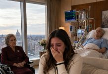My billionaire father was fighting for his life in the ICU when an elderly woman in a wheelchair suddenly grabbed my wrist. “Go home tonight,” she whispered. “And whatever you do, don’t let your husband know.” I thought grief had made her confused—until she slipped a tiny key into my palm. That night, while my husband believed I was still at the hospital, I unlocked his private office and discovered a false wall. Behind it were live surveillance feeds from inside my own home, financial records I’d never seen, and a forged will transferring $50 million after my father’s death. Then I noticed a freshly printed document bearing my full name. I read the first paragraph twice. My husband wasn’t only preparing to steal my inheritance—he was preparing for a future in which I wouldn’t be there to challenge him.