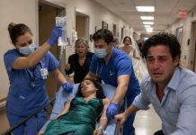 On my sister-in-law’s wedding day in Charleston, my appendix ruptured before the ceremony and I was rushed into emergency surgery. Hours later, barely awake and still connected to monitors, I heard shouting in the hallway. My mother-in-law stormed into my hospital room still wearing her wedding-day gown, furious that my emergency had “stolen attention” from her daughter. “Stop pretending!” she screamed. “Get out of that bed and prove you’re actually sick.” She reached toward my blankets—but my husband stepped between us for the first time in our marriage. He pressed the security button and said, “Touch my wife again and you’ll be removed.” His mother froze. Then he looked at the rest of his family and said the words that ended their control over us forever.