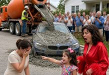 **My Neighbor Smirked as Her Husband Buried My Only Car Beneath a Layer of Concrete. I Stood There in Shock, Thinking They Had Just Destroyed the Last Thing That Could Save Me. Then My 8-Year-Old Son Tugged My Sleeve, Winked, and Whispered, “Mom… they just made their biggest mistake.”**